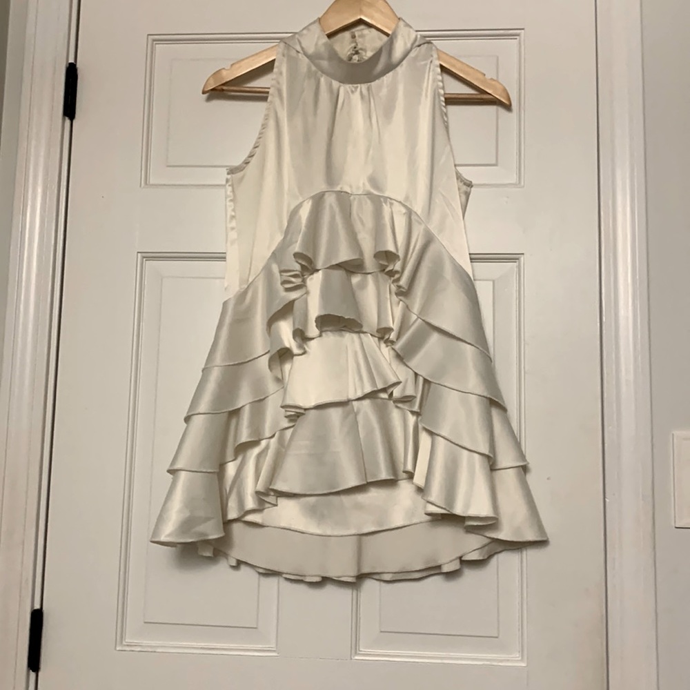 Gracia satin sleeveless shirt with ruffles